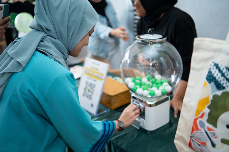 Woman with a gacha machine